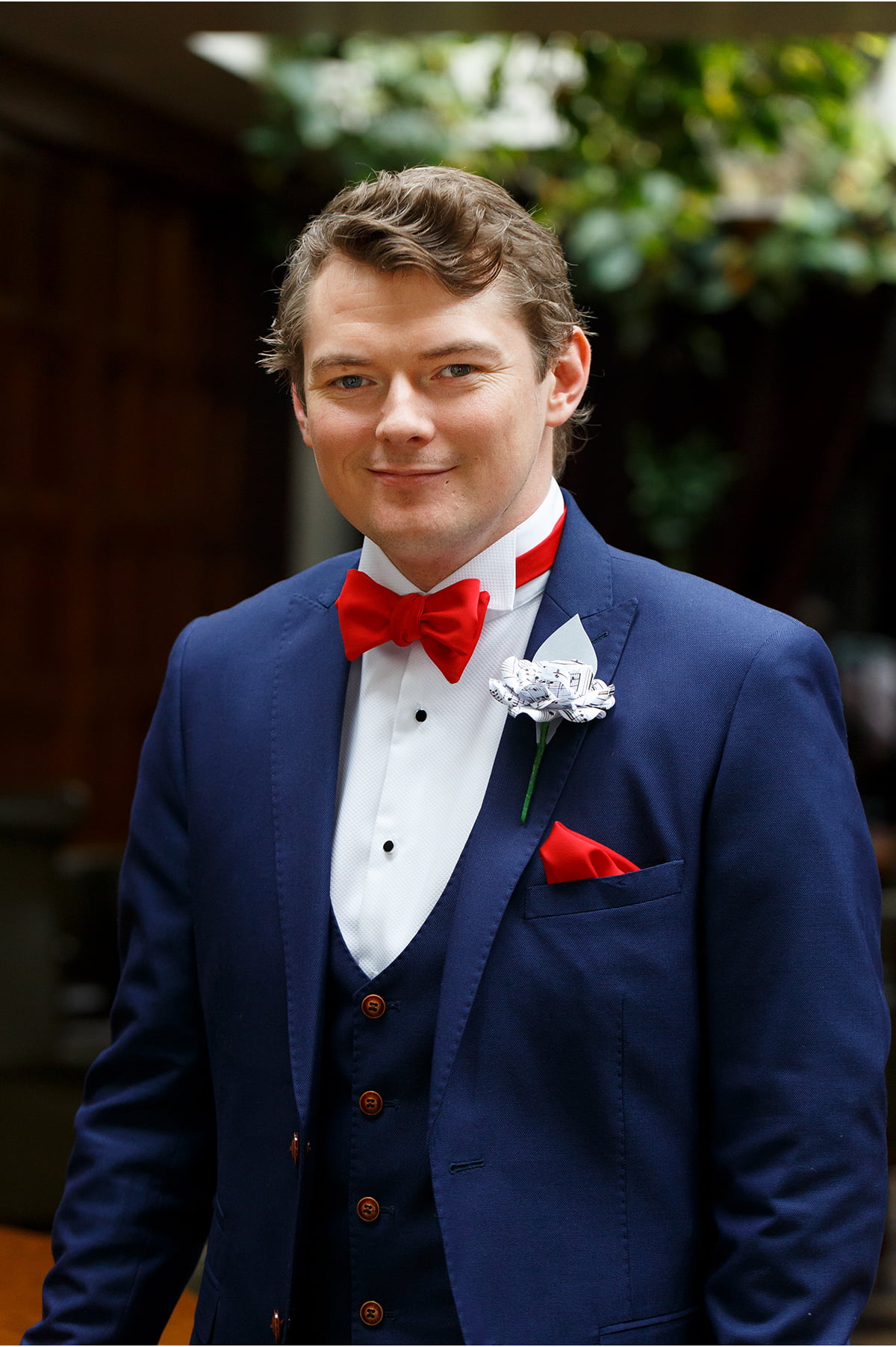 groom - red bowtie navy suit
