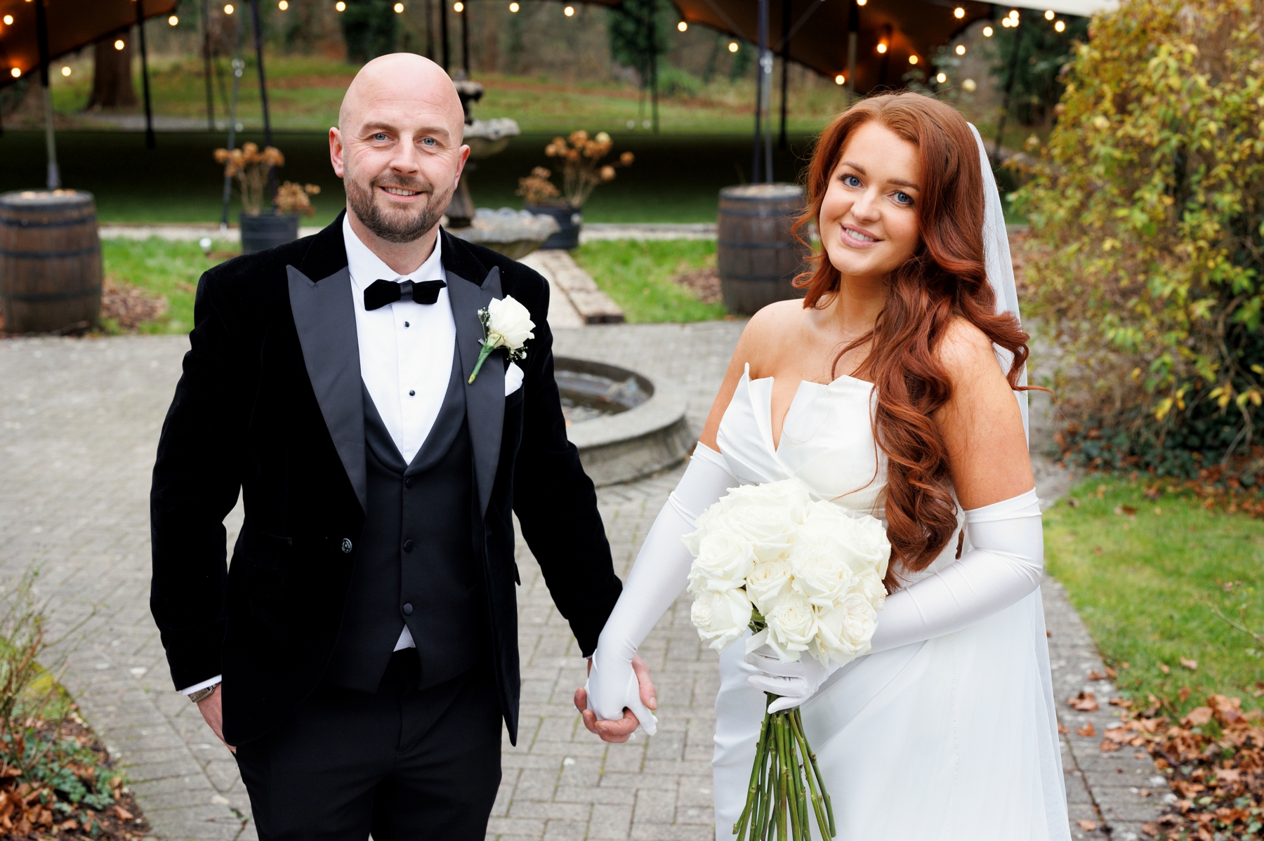 Black tie wedding couple at Castle Oaks Hotel