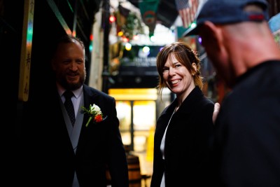 customer in the Mutton Lane wishes the bride and groom the best of luck in this cool Cork city wedding