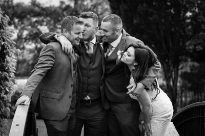 kisses for the groom, so fun wedding photography at this fun wedding in Ballyseede