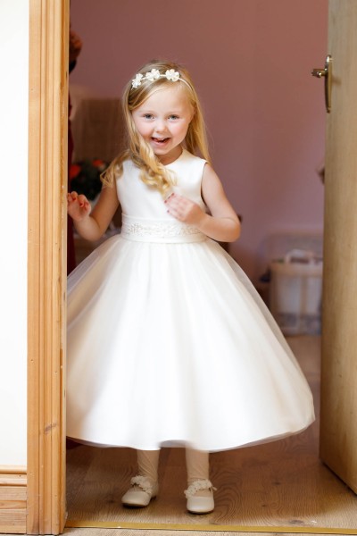 gorgeous little flower girl does a twirl