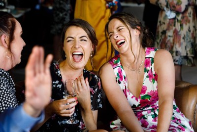 wedding guests laughing at East Cork wedding