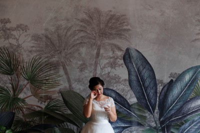 bride wipes a tear from her face during speeches at wedding in The River Lee Hotel. This photographs won an award from this is reportage