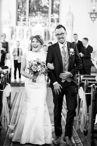 couple walk down the isle in Upperchurch wedding Co. Tipperary